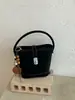 Bolso de Mano Nuevo para Mujer Primavera 2025: Bolso tipo cubo de alta gama, moderno, versátil, simple, Bolso cruzado de hombro de nicho