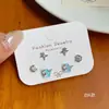 Pendientes de Mariposa Blancos K de Dibujos Animados Exquisitos para Gatos Pendientes Pequeños con Sentido de Diseño de Nicho para Mujer conjunto Pendientes de Yiwu al por Mayor