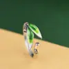 Anillo de plata S925 Rey Ciervo Dorado moda artística plata quemada hojas azules hojas de bambú anillo abierto de bambú anillo femenino regalo