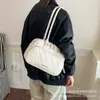Bolso de mano de nicho estilo coreano para mujer, nueva colección otoño 2026, bolso tote con patrón de diamantes, bolso de hombro de moda para el trabajo, y bolso de axila