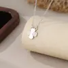 Collar de Trébol de Cuatro Hojas de la Suerte para Mujer 2025 Nueva Moda Versátil Elegante Nicho Lujo Ligero Diseño Floral Cadena para la Clavícula