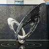 Escultura Personalizada de Cola de Fénix de Acero Inoxidable Iluminada para Exteriores con Alas de Forma Única que Pueden Iluminarse