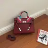 Bolso nuevo Kelly para mujer de gran capacidad, bolso de mano de moda con pañuelo de seda, elegante y versátil para el trabajo, bolso de hombro y cruzado