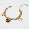 Pulsera de acero inoxidable y cuero de doble capa de moda europea y americana transfronteriza, pulsera de acero de titanio dorado de 18 quilates con figura de Mickey Mouse y trébol de cuatro hojas para mujer