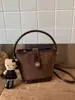 Bolso de Hombro de Moda Retro Nuevo Otoño e Invierno 2026 Transfronterizo, Bolso Cruzado Elegante, Bolso Tipo Cubo con Textura, Sensación de Alta Gama para Mujer