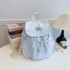 Mochila de viaje ligera de nailon casual para mujer con cordón 2026 nueva mochila escolar para estudiantes mochila de doble hombro de moda