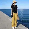 Conjunto Esportivo Feminino Estação Europeia 2026 Novo Verão Temperamento Redutor de Idade Senso de Design Manga Curta Irregular Duas Peças Tendência