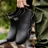 Botas de lluvia de moda para pareja transfronterizas Zapatos impermeables para exteriores de estilo coreano para mujer Zapatos de goma antideslizantes para cocina suela blanda cómodos Zapatos para lavado de autos mujer