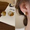 Pendientes geométricos redondos de la serie marrón Maillard, modernos, retro, sencillos y combinables, de alta gama y explosivos para mujer.