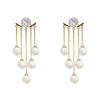@ Oferta especial Corea del Sur moda de lujo ligero dos usos borla de perla moda todo a juego temperamento pendientes de alto diseño