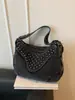 Bolso de hombro casual y de moda con remaches estilo coreano 2026, bolso de mezclilla diario para mujer
