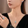 Juego de collar con colgante cuadrado de circón, aretes y anillo, joyería de lujo ligero, alta gama, elegante, diseño de nicho, venta al por mayor