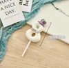 Vela digital transfronteriza con lindo moño rosa y decoración de sombrerito blanco para adorno de pastel de primera fiesta de cumpleaños