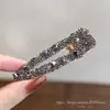 Estilo Coreano Dongdaemun Nuevo 2026 Otoño Triángulo Hueco Completo de Pedrería Pinza de Pico de Pato Sentido de Lujo Ligero Sensación de Espacio Pinza para el Cabello