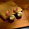 Brincos Stud Geométricos de Luxo Leve Estilo Francês para Mulheres, Brincos de Cobre Polido com Pedra Olho de Gato Rosa de Alto Padrão com Design de Nicho