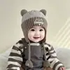 Gorro con orejas de pata de gato para bebé, gorro de punto cálido para otoño e invierno, diseño lindo de oso, unisex, gorro de lana a prueba de viento para bebés y niños pequeños