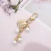 Llavero Colgante de Concha de Perla Nuevo Corazón de Perla Artificial Colgante Pequeño Exquisito para Bolso Teléfono Móvil Auriculares