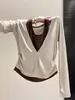 2026 Nuevo Diseño de Moda Sentido Falso Dos Piezas Camiseta de Manga Larga para Mujer Bloque de Color Cuello Halter Nicho Francés Capa Base Superior