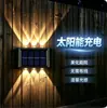 Luz lavaluz de pared para jardín exterior con iluminación hacia arriba y hacia abajo, iluminación ambiental decorativa, luz solar para patio, lámpara de pared solar para casa de villa