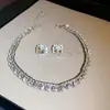 Conjunto de collar con colgante de gota de diamante transfronterizo para mujer, cadena para clavícula de moda nicho de lujo ligero, joyería versátil, sentido de alta gama para mujer