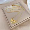 [Acero de titanio de cuerpo completo] Collar de oro real con personalidad de temperamento de mariposa de doble anillo, minimalista, para mujer, con cadena de clavícula