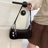 Bolso de mano pequeño casual minimalista transfronterizo para mujer, nuevo bolso cruzado elegante 2026, adecuado para el trabajo y los desplazamientos, bolso de hombro y bolso de axila