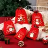 Bolsas de presente de Natal para atacado transfronteiriço, bolsas com cordão do Papai Noel, bolsas decorativas, sacos de doces, bolsas de presente de Natal