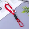 Cordón con Nudo de Paraguas Tejido de Colores, Cadena de Teléfono Trenzada de Colores, Colgante para Llavero Mochila, Decoración Exterior Unisex al por Mayor