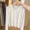 Cárdigan de punto de lino simple estilo coreano con hilo de seda de hielo para mujer, camisa de protección solar de verano, top corto fino de punto, cuello redondo, ligeramente transparente, holgado