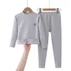2026 Conjunto de ropa interior térmica de algodón de color AB, sin costuras y engrosado para niños y niñas, tops y pantalones de otoño, ropa para el hogar, pijamas