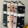 Calcetines de Lana Merino en Stock Venta al por Mayor Cálidos Jacquard Lazo Borde Enrollado Calcetines de Media Pantorrilla Calcetines Holgados para Mujer