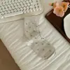 Los calcetines florales suaves de otoño tienen un sentido de atmósfera, los calcetines versátiles de media pantorrilla sin costuras retro geniales estilo Miu son dulces