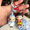 Nueva tendencia explosiva de pines de goma suave de PVC de dibujos animados, llavero, muñeco tridimensional, dos adornos colgantes, regalo