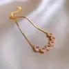 Pulsera Flor de Circonita Chapada en Oro Real Nicho Dulce Versátil Pulsera Temperamento Lujo Ligero Joyería de Gama Alta para Mujeres Al Por Mayor