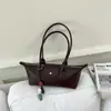 Bolsa Baguete de Luxo Nicho Francês Bolsa Horizontal de Bolinho de Massa de Alta Qualidade Bolsa de Mão Versátil para o Dia a Dia Ombro Único Transversal Sob o Braço