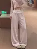 Pantalones anchos de rayas de encaje rosa, un estilo fino de verano para mujer, perfectos para crear un look dulce y elegante, favorecedores para figuras petite y versátiles para salidas casuales
