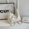 Bolsa feminina de grande capacidade primavera-verão 2026 nova moda mochila para trabalho bolsa de ombro única tipo balde tote bag
