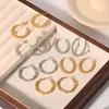 Pendientes de acero de titanio estilo Ins, pendientes de torsión elegantes, pendientes de círculo en forma de C, pendientes de acero inoxidable color oro de 18k, pendientes