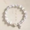 Pulsera de Flor Ojo de Gato para Mujer Nuevo Estilo Chino Fresco Estilo Lujo Ligero Versátil Flor de Loto Nafu Lúcido Marca Pulsera de Loto