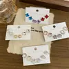 Joyería de Diamantes con Flor de Ciruelo Brillante de Nuevo Estilo, Diseño Geométrico Irregular Simple, Sensación de Lujo Ligero y Gama Alta, Múltiples Estilos de Aretes