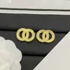 Nuevos Pendientes Doble C de Resina Acrílica Estilo Chanel 2025 para Mujer, Aguja de Plata, Pendientes Dopamina de Lujo de Alta Gama al por Mayor