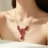 Conjunto de Cuatro Piezas de Collar, Pendientes, Anillo y Pulsera de Cristal Rojo y Azul de Alta Gama Europeo y Americano Transfronterizo con Baño de Oro Rosa para Mujer