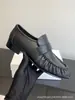 La fila Mocasines de Piel Arrugada Patrón de Anguila 2026 Primavera Tacón Bajo Punta Redonda Piel Genuina Apertura Profunda Zapatos de Una Sola Pieza Mujer