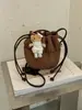 Bolso de Cubo con Cordón de Moda para Mujer 2026 Otoño Nuevo Estilo Versión Coreana para Mujer Bolso de Hombro Único de Cuero Suave Bolso Cruzado de Nicho de Gama Alta