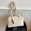Outono de 2026 Nova Moda Estilo Coreano Elegante Simples Bolsa de Axila Cor Sólida Bolsa de Ombro para o Dia a Dia Retrô Atacado Bolsa Feminina