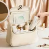 Bolsa de maquillaje de gran capacidad, estilo imitación Hua Yao, popular en línea, neceser portátil, estuche de maquillaje de viaje, venta al por mayor de fabricante de cosméticos