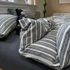 Juego de cuatro piezas de algodón arrugado lavado ultrasuave Clase A, funda de edredón a rayas simple, sábana, sábana ajustable, juego de tres piezas para cama de dormitorio estudiantil