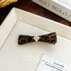 Grampo de Cabelo Clip BB com Estampa de Leopardo Cor de Café Flor de Íris Dourada Coreana Acessório de Cabelo Fashion de Alta Qualidade Franja Lateral