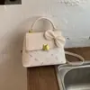 Bolsa Casual da Moda Transfronteiriça Estilosa de Celebridade da Internet Nova Coleção Primavera 2026 Bolsa Feminina Versátil Retro Pequena Quadrada de Ombro