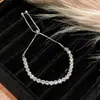Pulsera de zirconita geométrica europea y americana con costuras de alta gama, simple, de cordón ajustable, nicho, exquisita, nueva joyería al por mayor